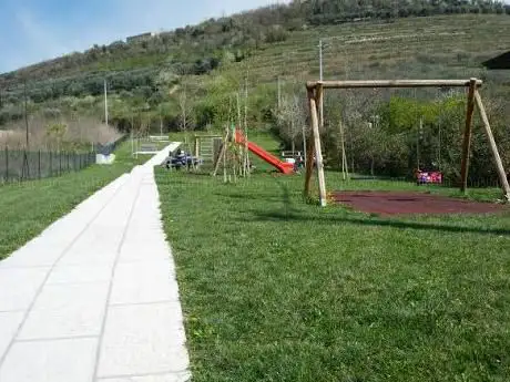 Photo de Parco Giochi Comunale