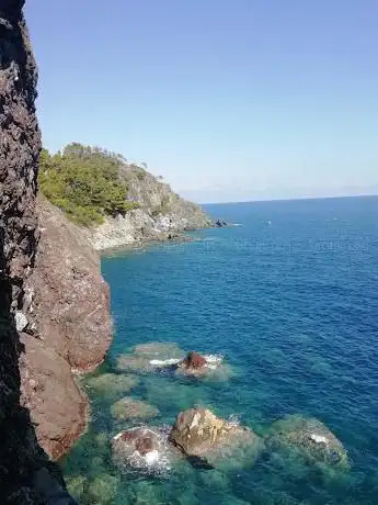 Photo de Spiaggia Naturista guvano
