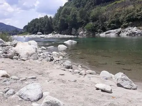 Photo de Isolella Beach spiaggia al fiume
