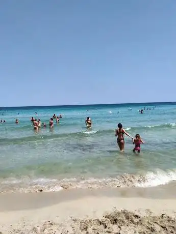 Photo de Spiaggia libera