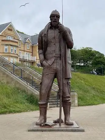 A High Tide In Short Wellies by Ray Lonsdale