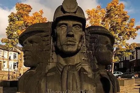Miner Heads Statue