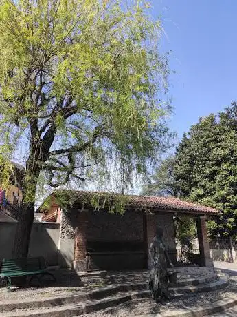 Photo de Statua della Lavandaia