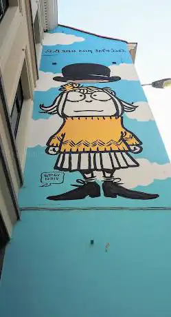 Street Art Mural: Bambina Magritta by Vanna Vinci