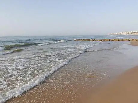 Photo de Spiaggia Pantano Arizza