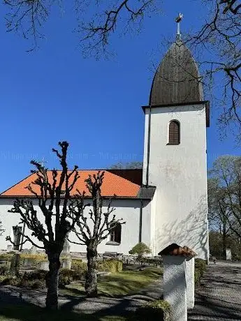 Photo de Östra Eds Kyrka & Kyrkogård