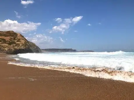 Photo de Praia do Penedo
