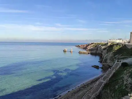 Photo de L' Isolotto (Cala Rossa)