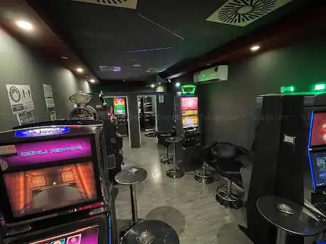 Photo de sala slot vlt pianeta slot