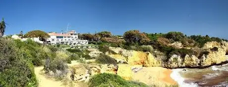 Photo de Praia dos Tremoços