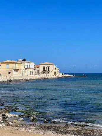 Photo de Sampieri Beach