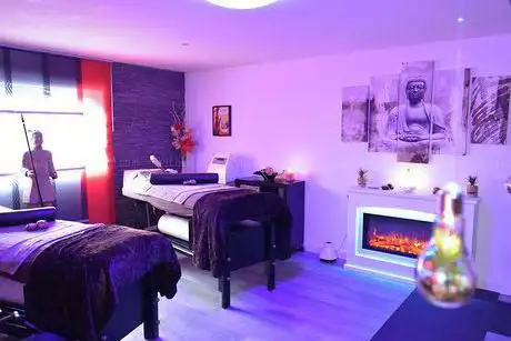 Photo de Suite Nathacia jacuzzi sauna hammam