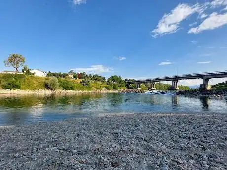 Photo de Spiaggetta del ponte di Campo San Martino