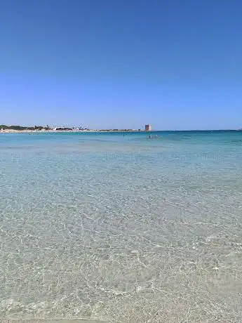 Photo de Spiaggia libera Scalo di Furno