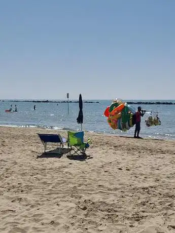 Photo de Spiaggia libera