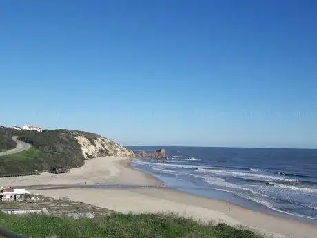 Photo de Praia das Paredes
